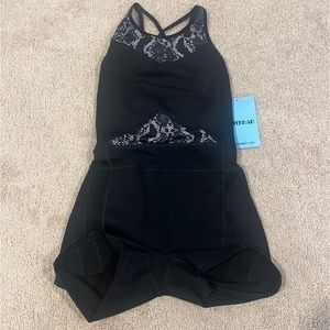 Fleo singlet size extra small